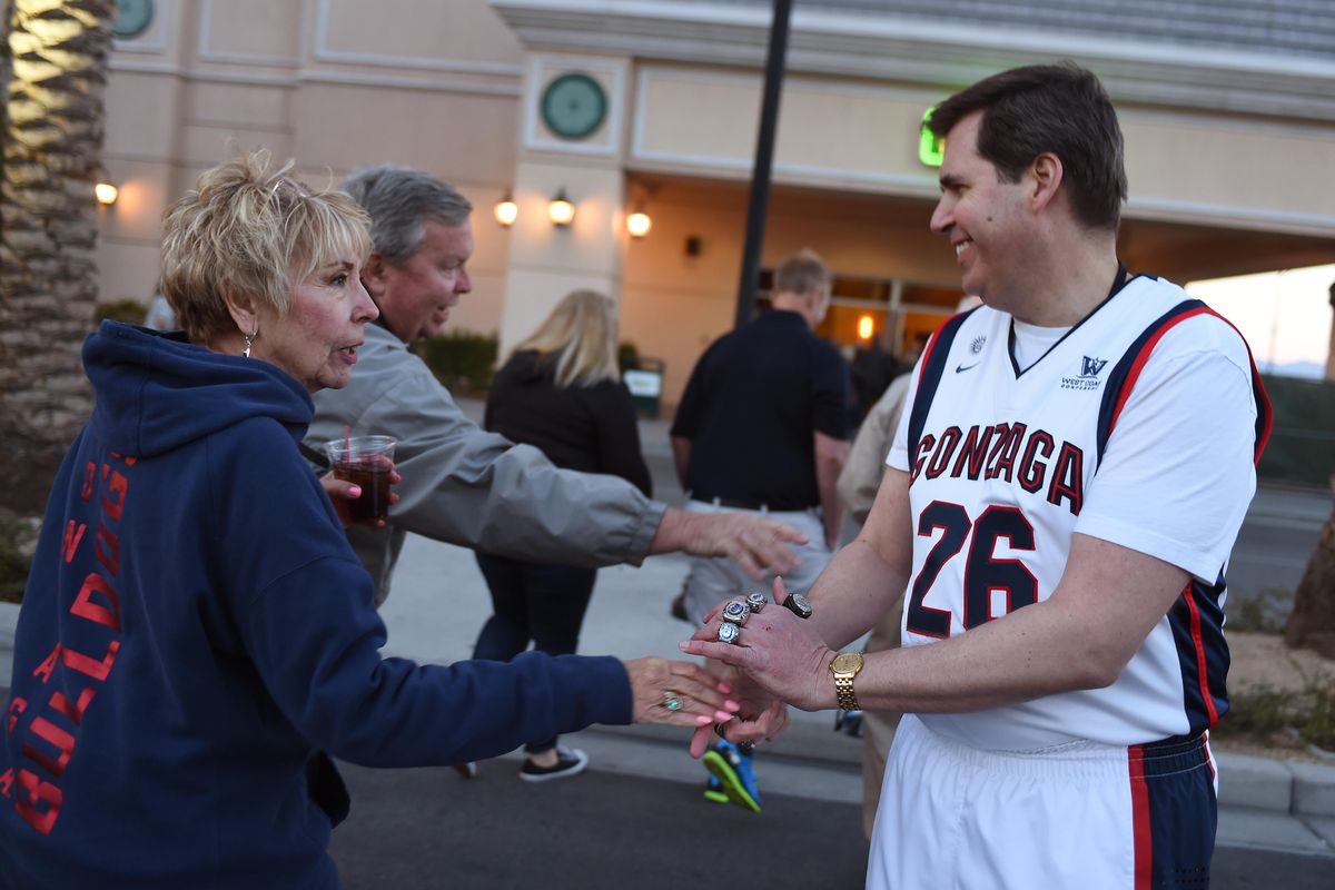 Before the game with San Francisco, Gonzaga President Thayne McCulloh, greets fans outside the Orleans Arena wearing a custom Zags basketball uniform with the number 26 because he is the 26th president of the university. (Colin Mulvany / The Spokesman-Review)