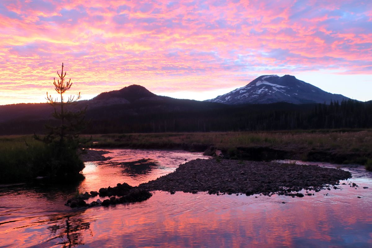 The sun sets over a backcountry camp in Deschutes National Forest near Bend. (John Nelson)