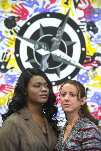 The Leadership Spokane class is paying to send Kitara Johnson, left, and Megan Curran to Colorado. Megan is a  member of Leadership Spokane while Kitara is a past member. Megan will visit her parents’ graves and Kitara will see her son compete in collegiate wrestling. (Dan Pelle / The Spokesman-Review)