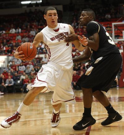 Washington State guard Klay Thompson (1) draws a foul on Idaho guard Kashif Watson, right, on his way to a layup during the first half of an NCAA college basketball game Wednesday, Dec. 9, 2009 at Beasley Coliseum in Pullman, Wash. (Dean Hare / Fr158448 Ap)