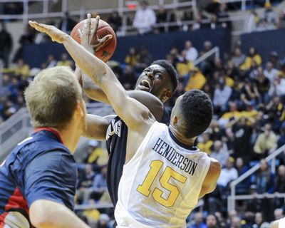 Gonzaga guard Gary Bell, Jr. looks to shoot over West Virginia's Terry Henderson (15). (AP)