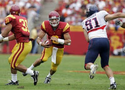 
Mark Sanchez, center, has effectively run USC's offense. Associated Press
 (Associated Press / The Spokesman-Review)