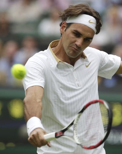 Roger Federer opened Wimbledon with a straight-sets victory. (Associated Press / The Spokesman-Review)
