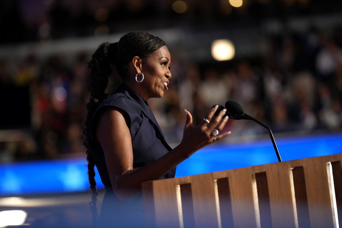 Former first lady Michelle Obama speaks on stage Aug. 20 during the second day of the Democratic National Convention at the United Center in Chicago.  (Getty Images)