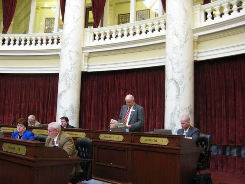 Sen. Bert Brackett urges senators to approve the House-amended version of the Senate animal cruelty bill, which adds cockfighting penalties, along with Idaho's first felony penalty for animal cruelty. (Betsy Russell)