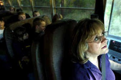 
Maryann Ferry checks to make sure the children are seated before closing the bus door and continuing her route in the Freeman School District Thursday. 
 (Holly Pickett / The Spokesman-Review)