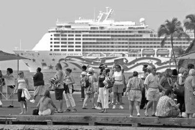 
The itinerary for Norwegian Cruise Line's Pride of America includes a nighttime pass by active lava flows on the Big Island and, as the boat leaves its Kauai port of call, it passes alongside the rugged and beautiful Na Pali Coast.
 (File/Associated Press / The Spokesman-Review)