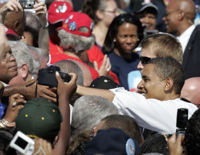 Sen. Barack Obama, D-Ill., shakes hands after a rally Saturday in Newport News, Va. (Associated Press / The Spokesman-Review)