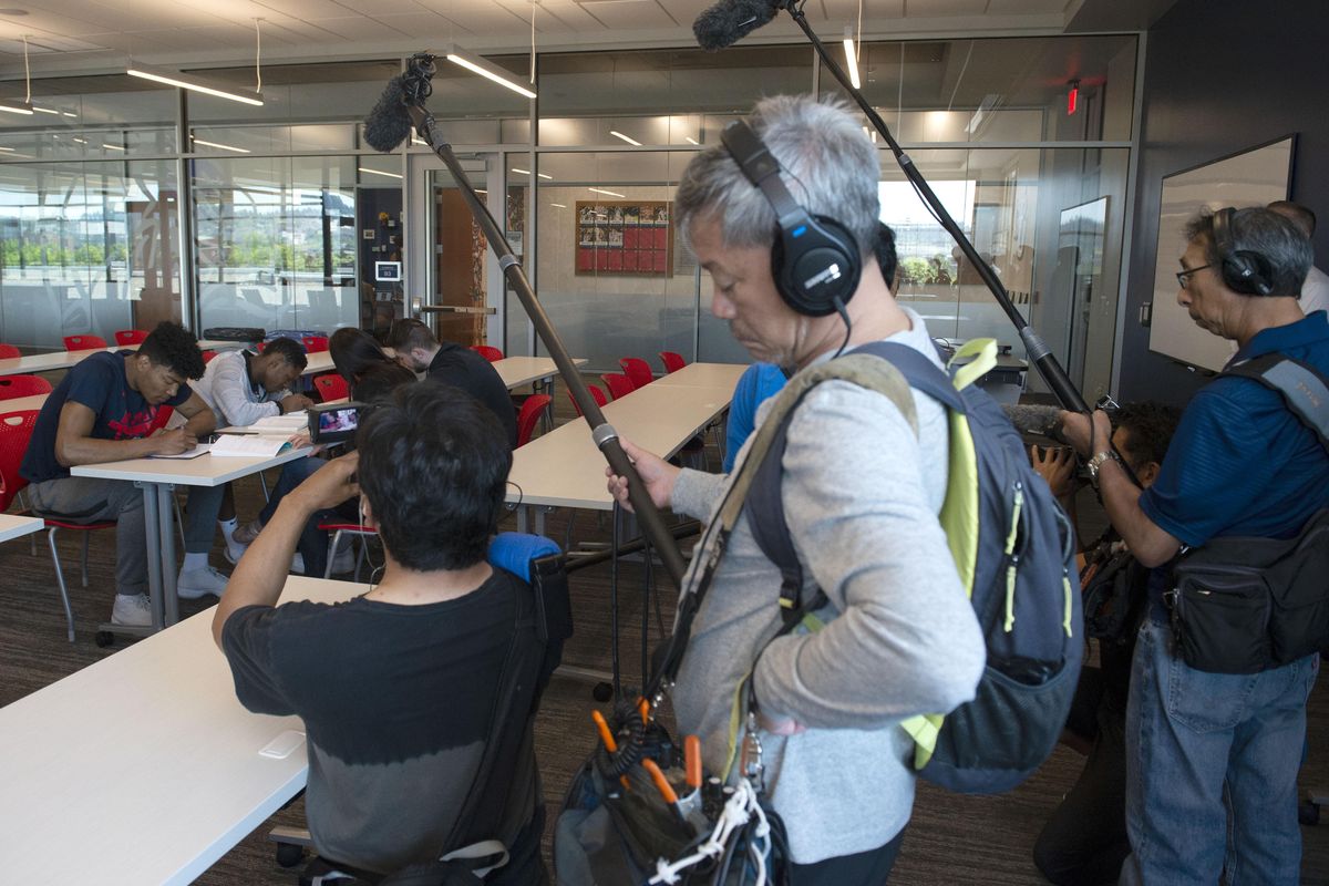 Japanese TV media shoot video of Rui Hachimura in a scripted study session on campus with fellow Gonzaga basketball teammates Joel Ayayi, and Killian Tillie, Tuesday, May 22, 2018. (Colin Mulvany / The Spokesman-Review)
