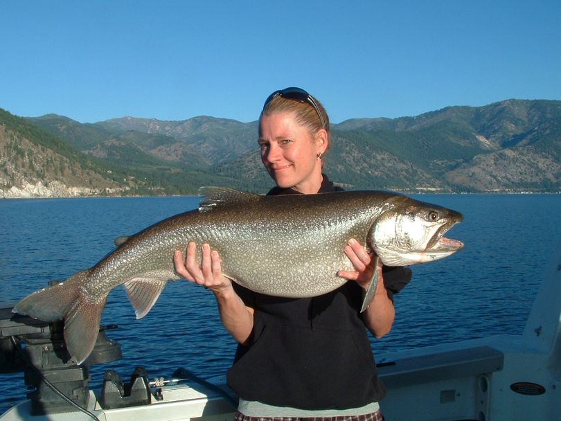 Jolene Rhoads of Spangle poses with a 21-pound 3 ounce Lake Chelan lake trout she caught while fishing with guide Jeff Witkowski of Darrell & Dad's Family Guide Service. (Darrell & Dad's Family Guide Service)