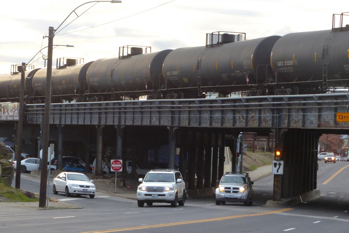 FILE - An oil train crosses Sprague and Division Street in Spokane in March 2016. (Jesse Tinsley / The Spokesman-Review)