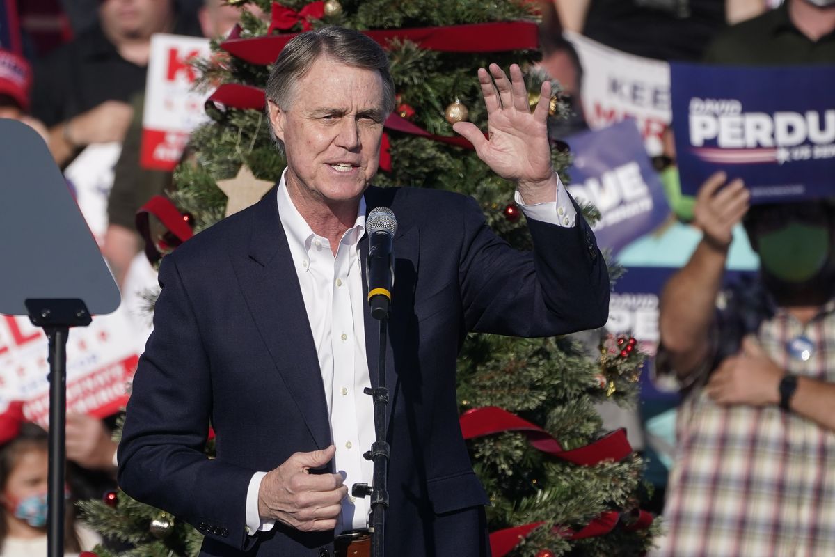 FILE - Sen. David Perdue, R-Ga., speaks during a rally in Augusta, Ga., on Dec. 10, 2020. Perdue will challenge Gov. Kemp for governor, he announced Monday, Dec, 6, 2021 setting up a bitter 2022 Republican primary fight while Democrat Stacey Abrams is likely to await the winner.  (John Bazemore)