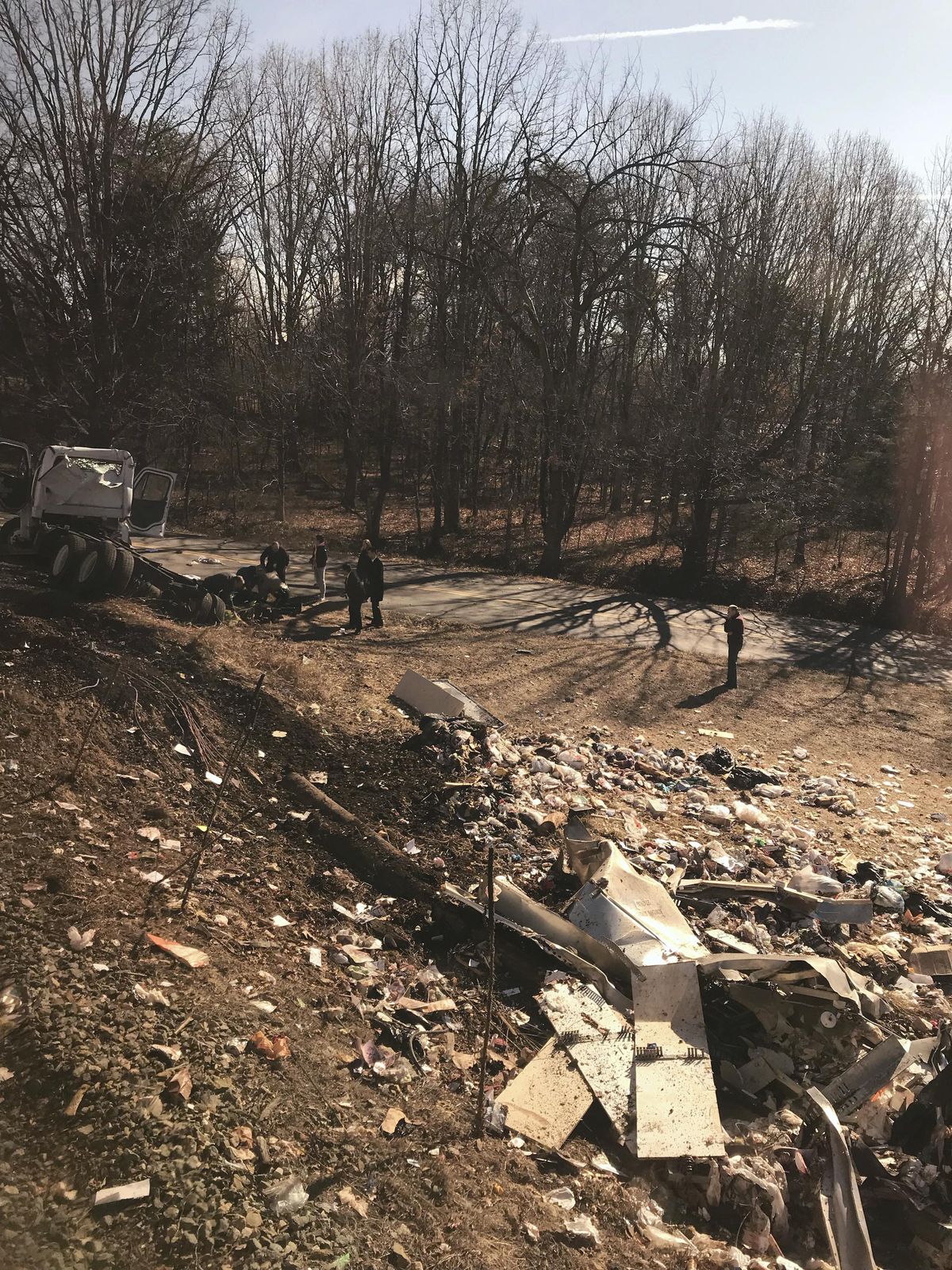 This photo provided by Rep. Greg Walden, R-Oregon, shows a crash site near Crozet, Va., Wednesday, Jan. 31, 2018. A chartered train carrying dozens of GOP lawmakers to a Republican retreat in West Virginia struck a garbage truck south of Charlottesville, Virginia on Wednesday, lawmakers said. (Rep. Greg Walden / AP)