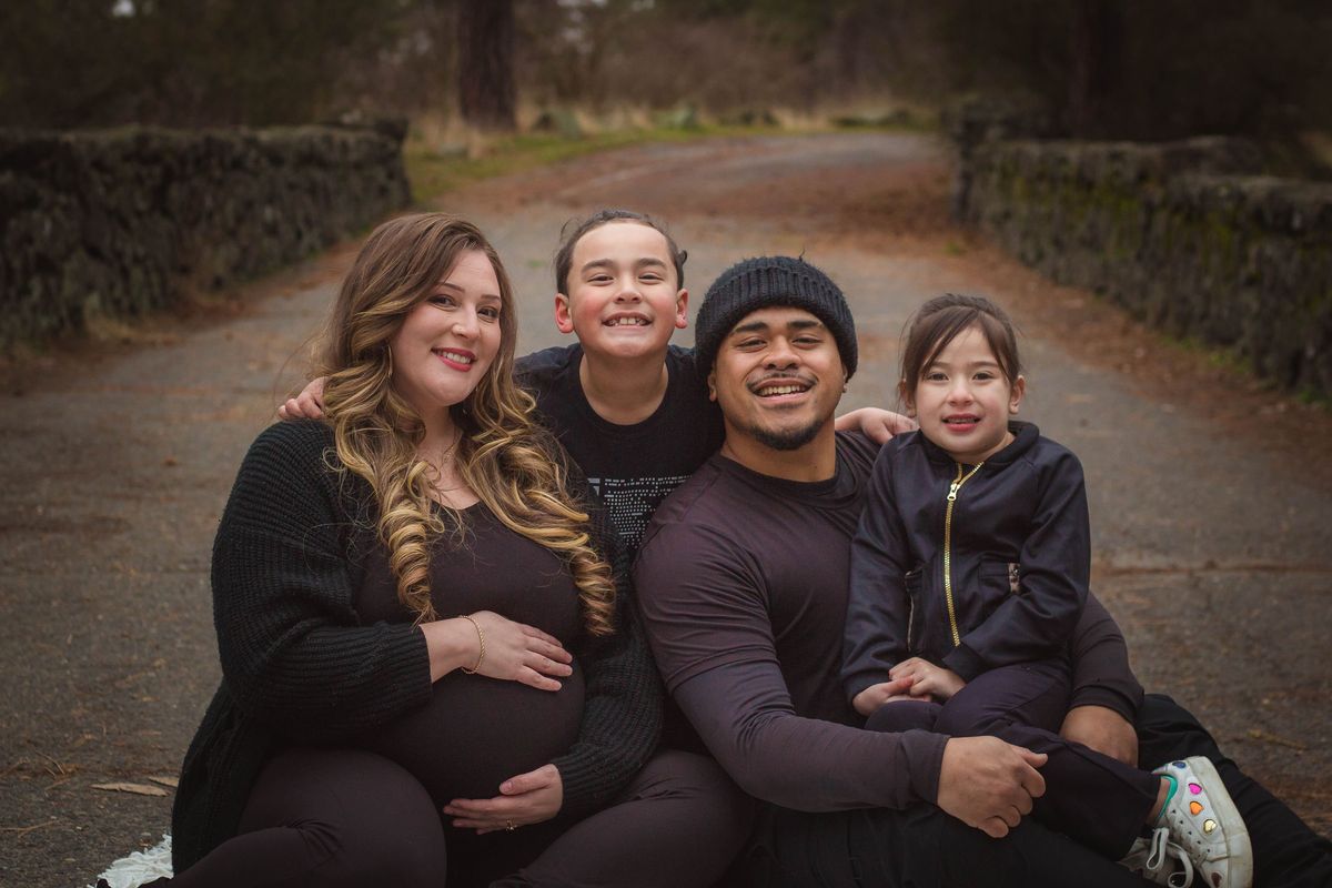 Savannah and Tupu Jr. Failauga, along with their kids, Khaleo, 8, and Khiari, 5, pose for a photo. Their third child, Khaliope, was born on Jan. 23. 