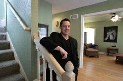 
Brett McPherson, a Milwaukee realty sales associate, has been rehabbing a water-damaged house that he initially purchased for $140,000 and recently has been appraised at $400,000. 
 (Knight Ridder / The Spokesman-Review)