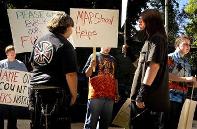 
Students, parents and alumni of two alternative schools protest their closure – part of the county's mental health cuts – on Eighth Avenue on Friday. 
 (Jed Conklin / The Spokesman-Review)