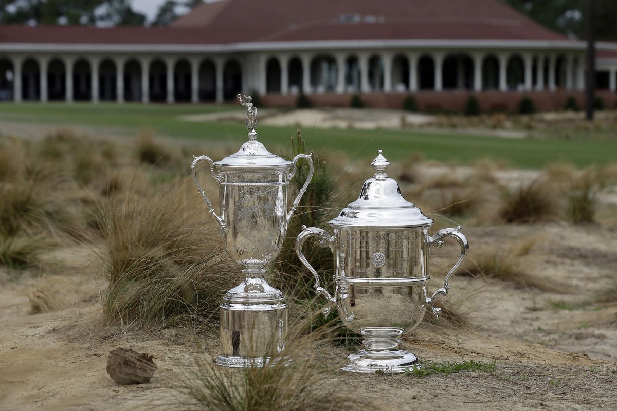 Trophies for the men’s and women’s U.S. Open will be presented at Pinehurst, which will host both tournaments in consecutive weeks. (Associated Press)