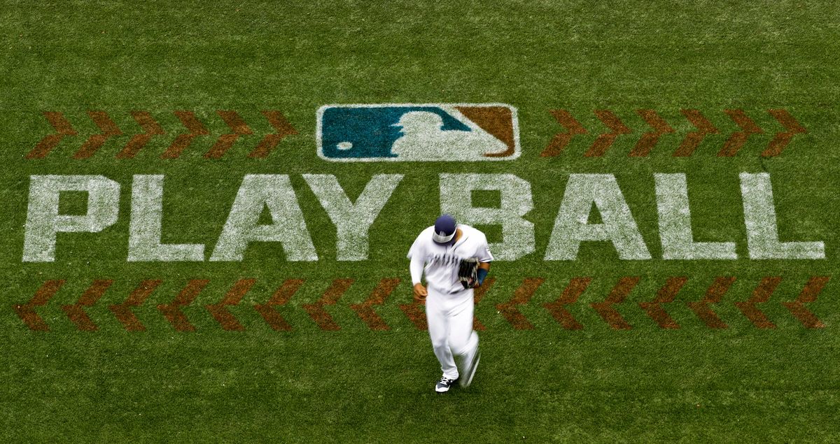 San Diego Padres left fielder Allen Cordoba passes a logo for Play Ball, an initiative from Major League Baseball and USA Baseball, during the fifth inning of a baseball game against the Colorado Rockies on June 3, 2017, in San Diego. Players voted Thursday, March 10, 2022, to accept MLB