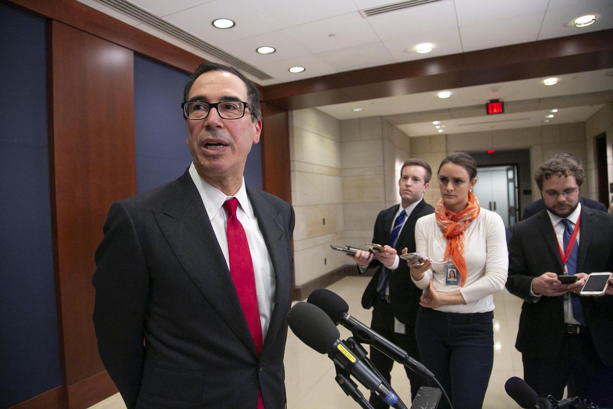 Treasury Secretary Steven Mnuchin speaks to reporters after giving a classified briefing to members of the House of Representatives, telling them that the Trump administration will keep strict U.S. sanctions on the Russian oligarch Oleg Deripaska, on Capitol Hill in Washington, Thursday, Jan. 10, 2019. (J. Scott Applewhite / Associated Press)