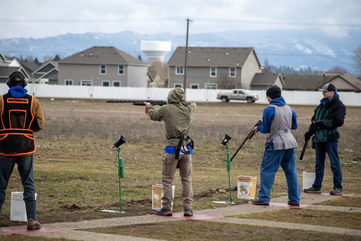 Members of the Coeur d’Alene High School Skeet and Trap Team shoot a round of trap on Feb. 10 in Coeur d’Alene.  (Michael Wright/THE SPOKESMAN-REVIEW)