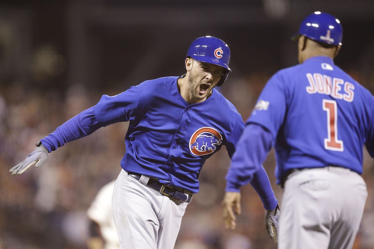 In this Oct. 10, 2016, file photo, Chicago Cubs’ Kris Bryant, left, celebrates after hitting a two-run home run against the San Francisco Giants during the ninth inning of Game 3 of baseball’s National League Division Series in San Francisco. (Ben Margot / Associated Press)