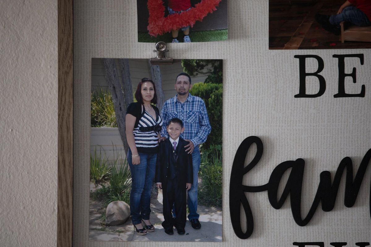 Family photos hang in the kitchen of Patricia Osorio's home on July 13, 2022, in Linda Vista, California.    (Ana Ramirez/San Diego Union-Tribune/TNS)
