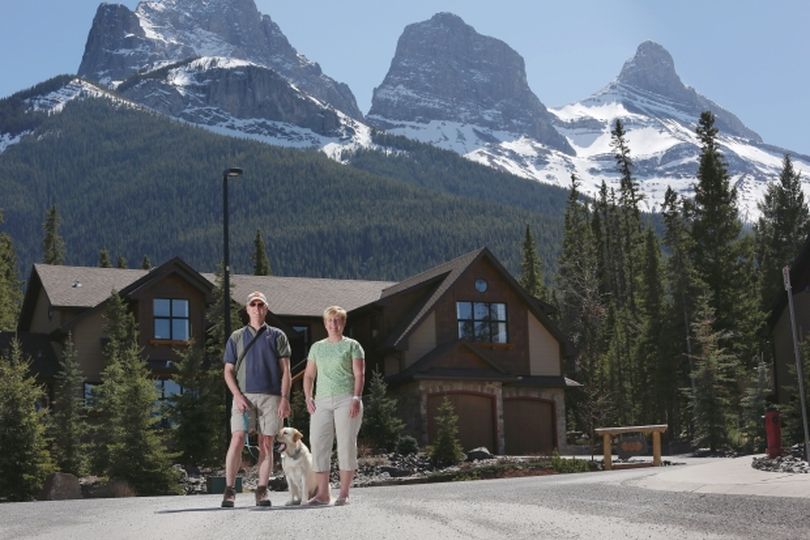 Paul Lessard and neighbour Kay Anderson are concerned about the effect of Three Sisters Mountain Village development plan in Canmore on wildlife in the area. (Calgary Herald)