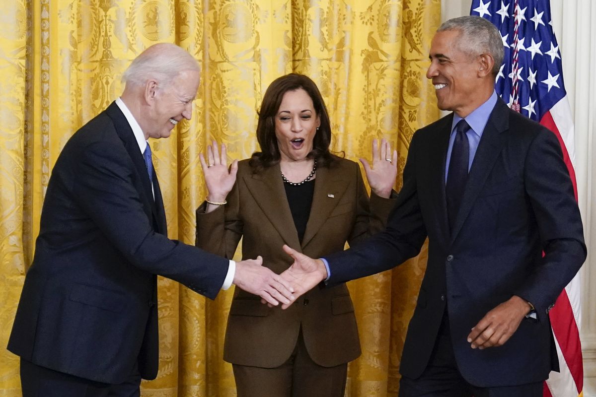 Vice President Kamala Harris reacts as President Joe Biden shakes hands with former President Barack Obama after Obama jokingly called Biden vice president in the East Room of the White House in Washington, Tuesday, April 5, 2022.  (Carolyn Kaster)