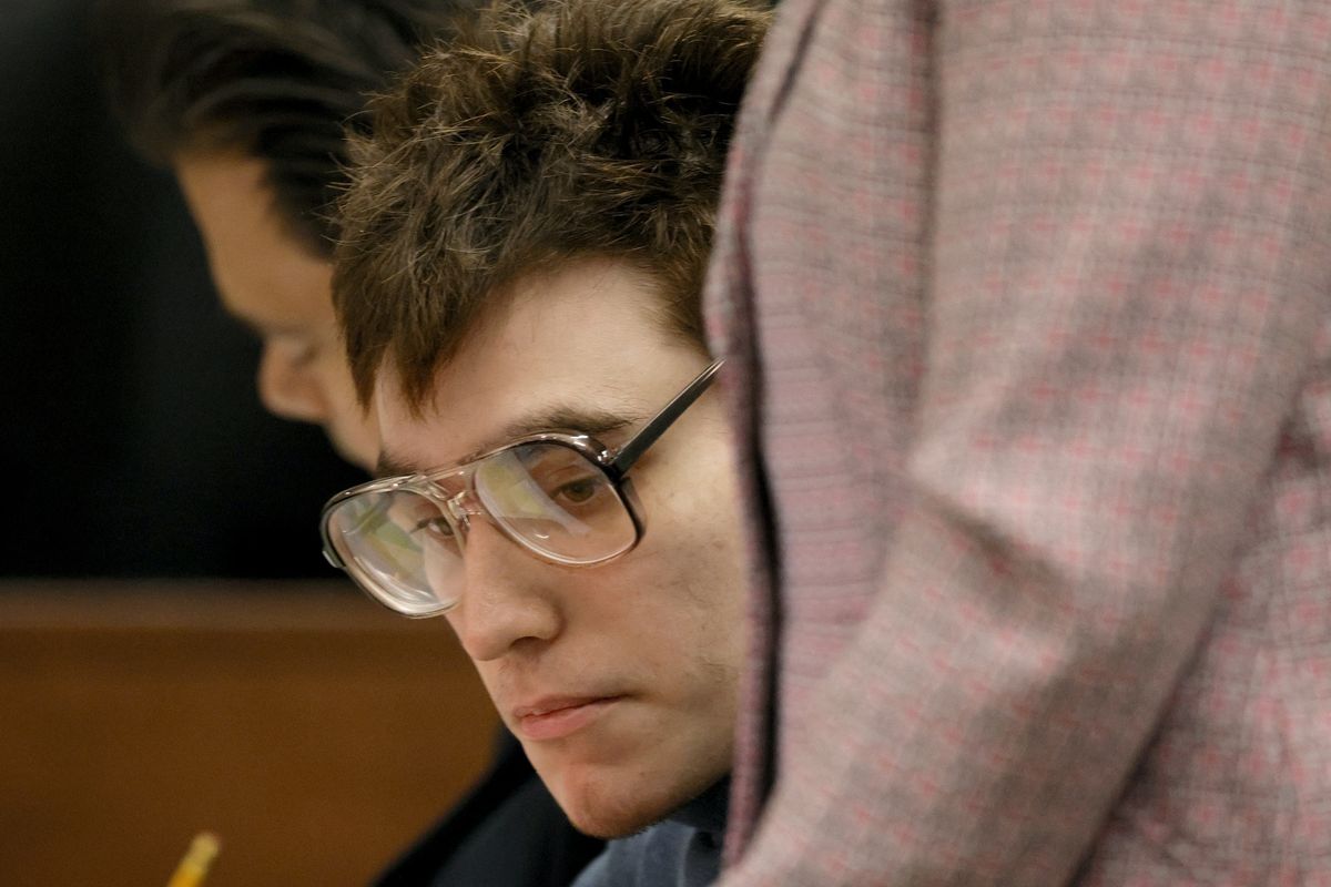 FILE -Marjory Stoneman Douglas High School shooter Nikolas Cruz is shown at the defense table during jury pre-selection in the penalty phase of his trial at the Broward County Courthouse in Fort Lauderdale, Fla. on Tuesday, April 12, 2022. Confusion reigned as jury selection in the death penalty trial of Florida school shooter Nikolas Cruz concluded its second week with no immediate end in sight.  (Amy Beth Bennett)