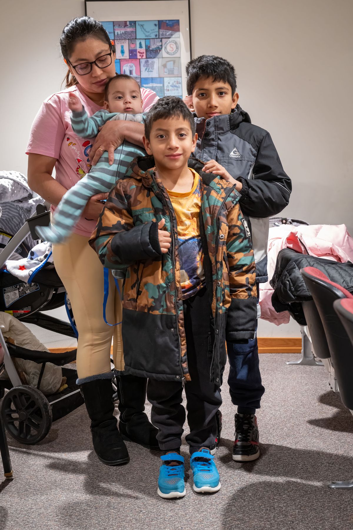 Alberto Lovo Rojas’ wife, Dora, and their three children, Santiago, 5 months, left, Mateo, 7, and Alberto Jr., 10, attend a Spokane City Council meeting earlier this year. Alberto was picked up by ICE in February and is now in the Tacoma detainment center. Alberto came to the U.S. in 2019 seeking asylum from the Nicaraguan government after his uncle was shot in the street during a protest. (COLIN MULVANY/THE SPOKESMAN-REVIEW)