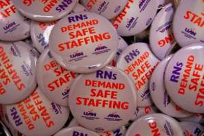 
Shown are the buttons Sacred Heart Medical Center nurses wore to express concerns about staffing levels.
 (Courtesy of Washington State Nurses Association / The Spokesman-Review)