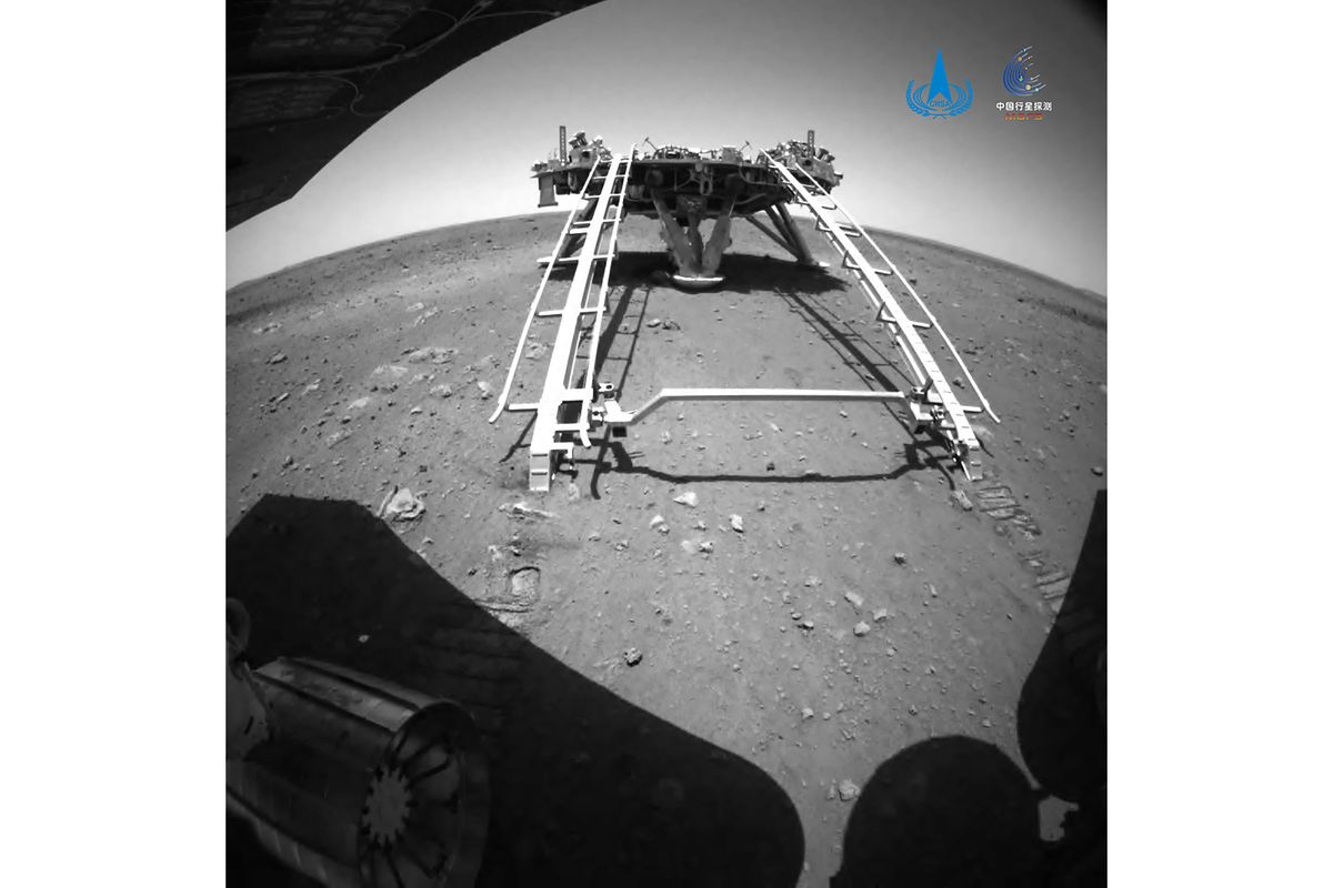 In this image released by the China National Space Administration (CNSA) on Saturday, May 22, 2021, a landing platform and the surface of Mars are seen from a camera on the Chinese Mars rover Zhurong. China