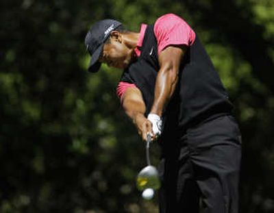 Associated Press For the week, Tigers Woods was just 4-under on the par-5s and ranked 21st in putting.
(Associated Press / The Spokesman-Review)