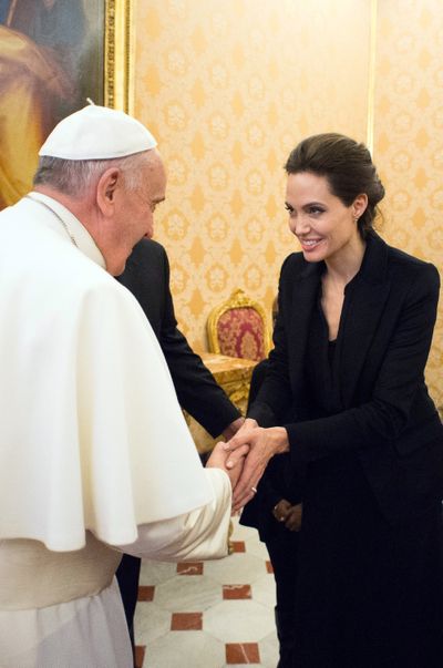 Pope Francis greets Angelina Jolie at the Vatican on Thursday. (Associated Press)