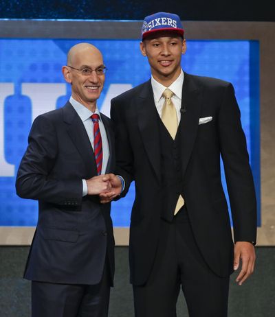 LSU’s Ben Simmons poses with NBA commissioner Adam Silver after being selected as the top pick by the Philadelphia 76ers during the NBA draft on Thursday. (Frank Franklin II / Associated Press)