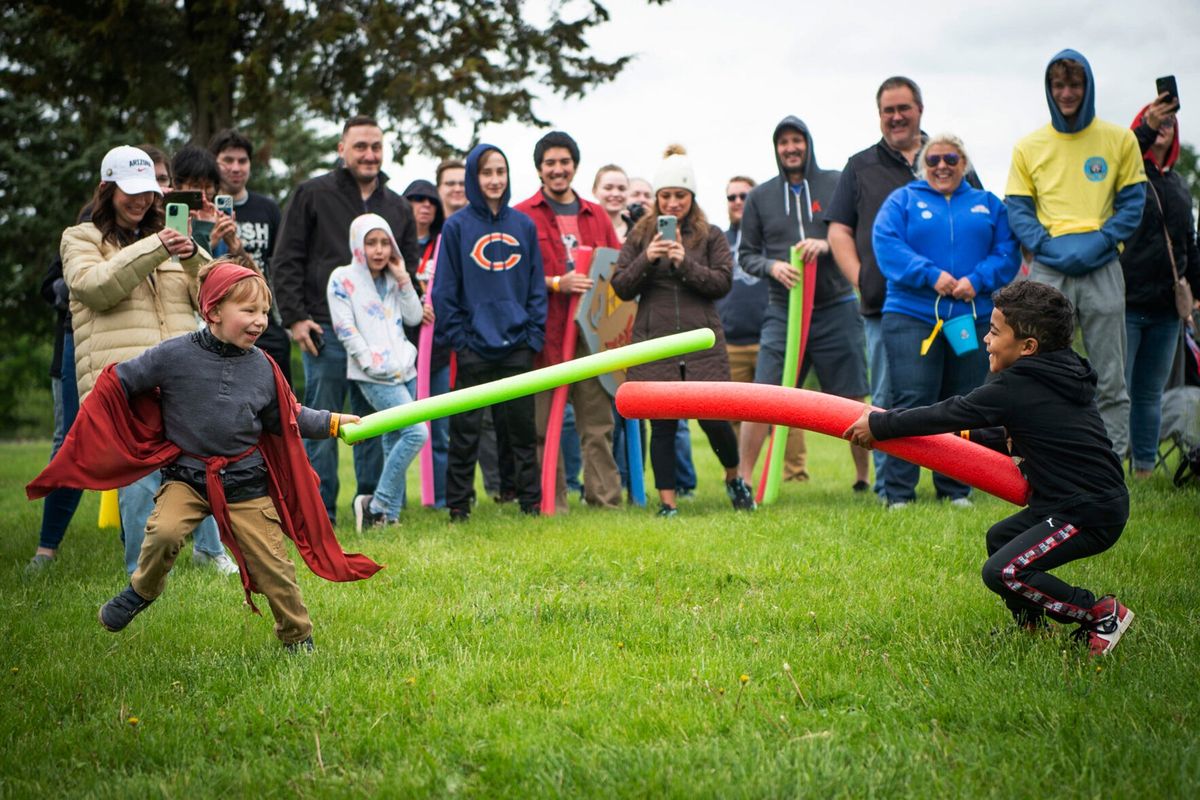 Joshua Memphis Folmar, 4, left, battles reigning champion Josh Vinson Jr., 5, during the second annual Josh Fight at Bowling Lake Park, in Lincoln, Neb., Saturday, May 21, 2022. For the second time in Lincoln