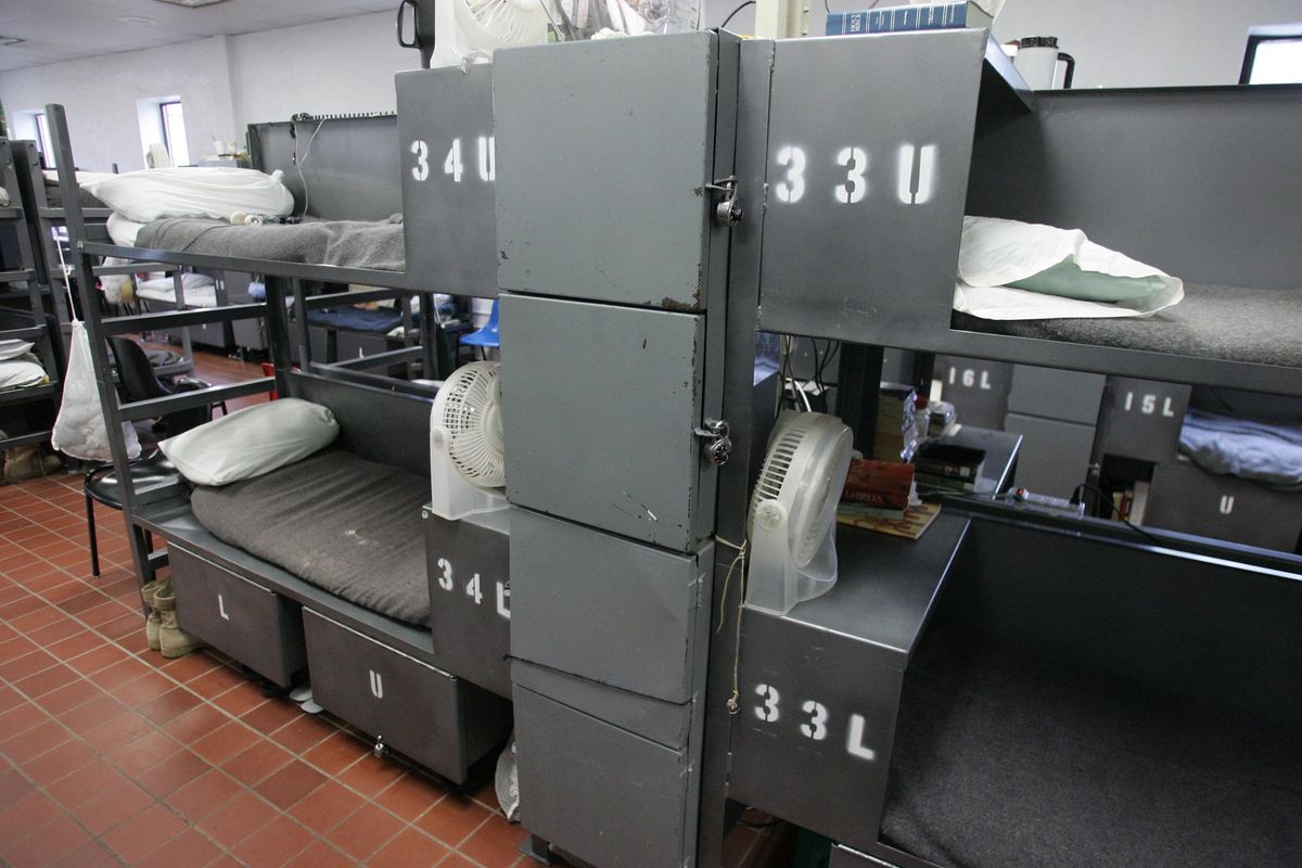 In this Monday, May 10, 2010, inmates in unit four of the John Lilley Correctional Center in Boley, Okla., are housed in a building originally built as a dining facility. Shown here are the bunk beds and limited storage space allocated to each inmate. Oklahoma has the nation’s highest incarceration rate, overcrowded prisons and skyrocketing costs. (Sue Ogrocki / AP)