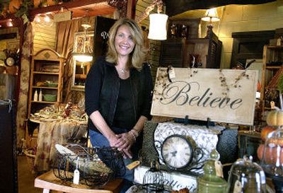 
Darcee Terhaar, one of the owners of Trellis Marketplace, poses in the shop earlier this month.  Terhaar and four other women opened the store more than two years ago. 
 (Joe Barrentine / The Spokesman-Review)