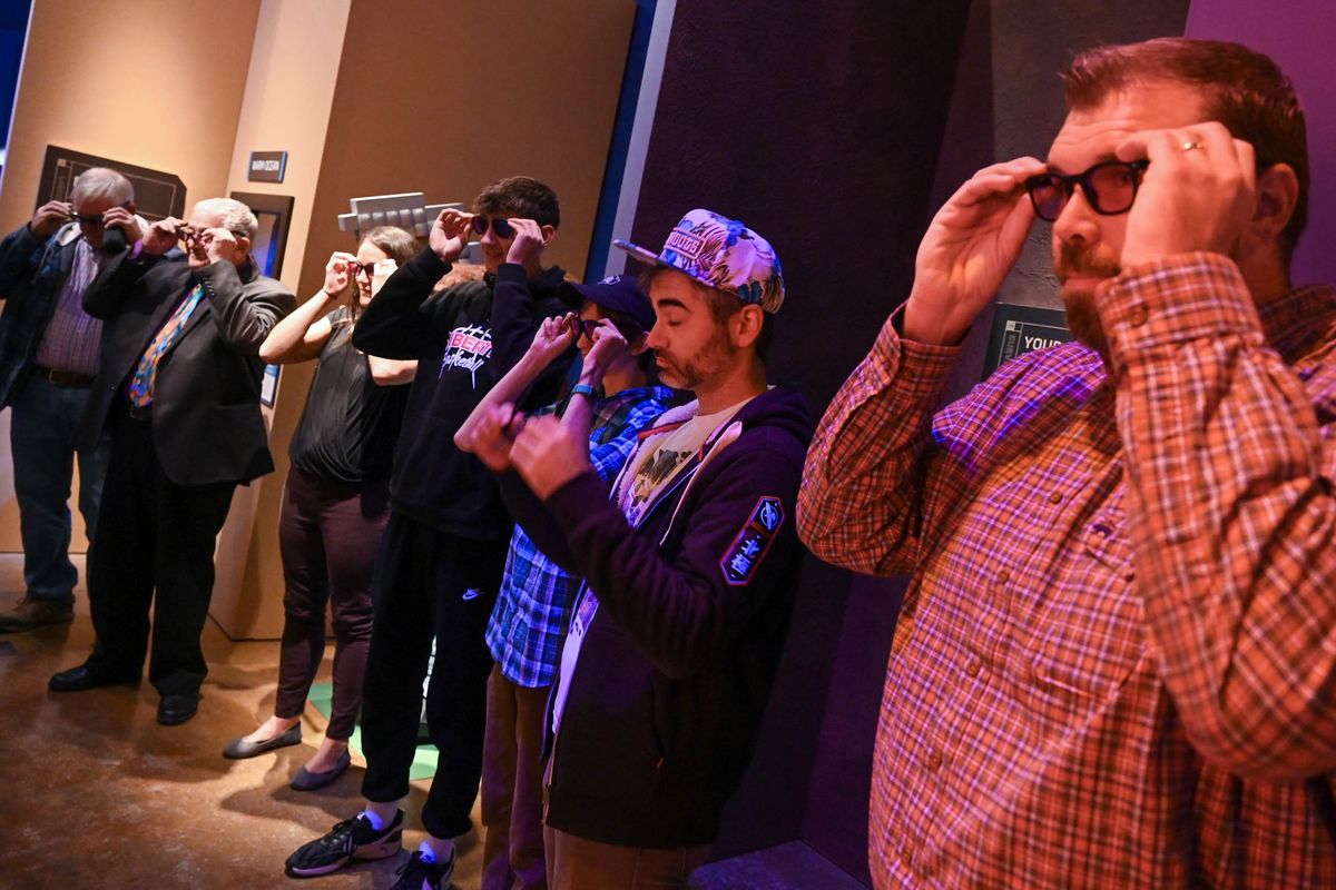 Color blind visitors gather for a demonstration of EnChroma glasses, Thursday, Sept. 28, 2023, at the Northwest Museum of Arts and Culture.  (DAN PELLE/THE SPOKESMAN-REVIEW)