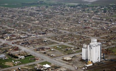 
Greensburg, Kan., was flattened by a tornado Saturday, which officials say could have been a half-mile wide. 
 (Associated Press photos / The Spokesman-Review)