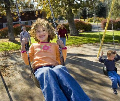 
Three generations of the Bennett family enjoy a day in Reaney Park in Pullman on Saturday. From left are Anne, Anna, Laurel and Eli.
 (Christopher Anderson / The Spokesman-Review)