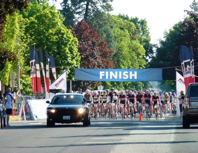 Cyclists get an escort from Cheney at the start of the 2014 Jedermann Gran Fondo.