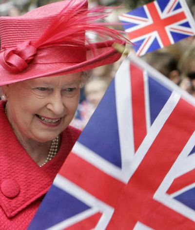 
Britain's Queen Elizabeth II meets the public during a walkabout to celebrate her 80th birthday in Windsor, England, on Friday. 
 (Associated Press / The Spokesman-Review)