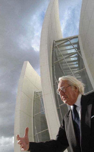 
American architect Richard Meier gestures in front of his white concrete and glass Jubilee Church, also known as Dives in Misericordia, located in the Tor Tre Teste area of Rome. The church is made of self-cleaning concrete that helps keep the surface shiny white, even in smoggy urban conditions.
 (Associated Press / The Spokesman-Review)