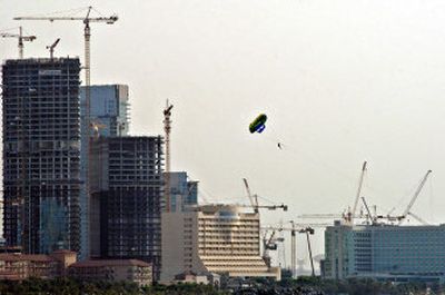 
A kite flies over construction sites of Jumeira Beach Towers in Dubai, United Arab Emirates on Thursday. 
 (Associated Press / The Spokesman-Review)