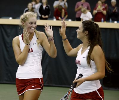 Erin Routiffe, left, and Maya Jansen, a Freeman graduate, are two-time NCAA women’s doubles national champs. (Associated Press)