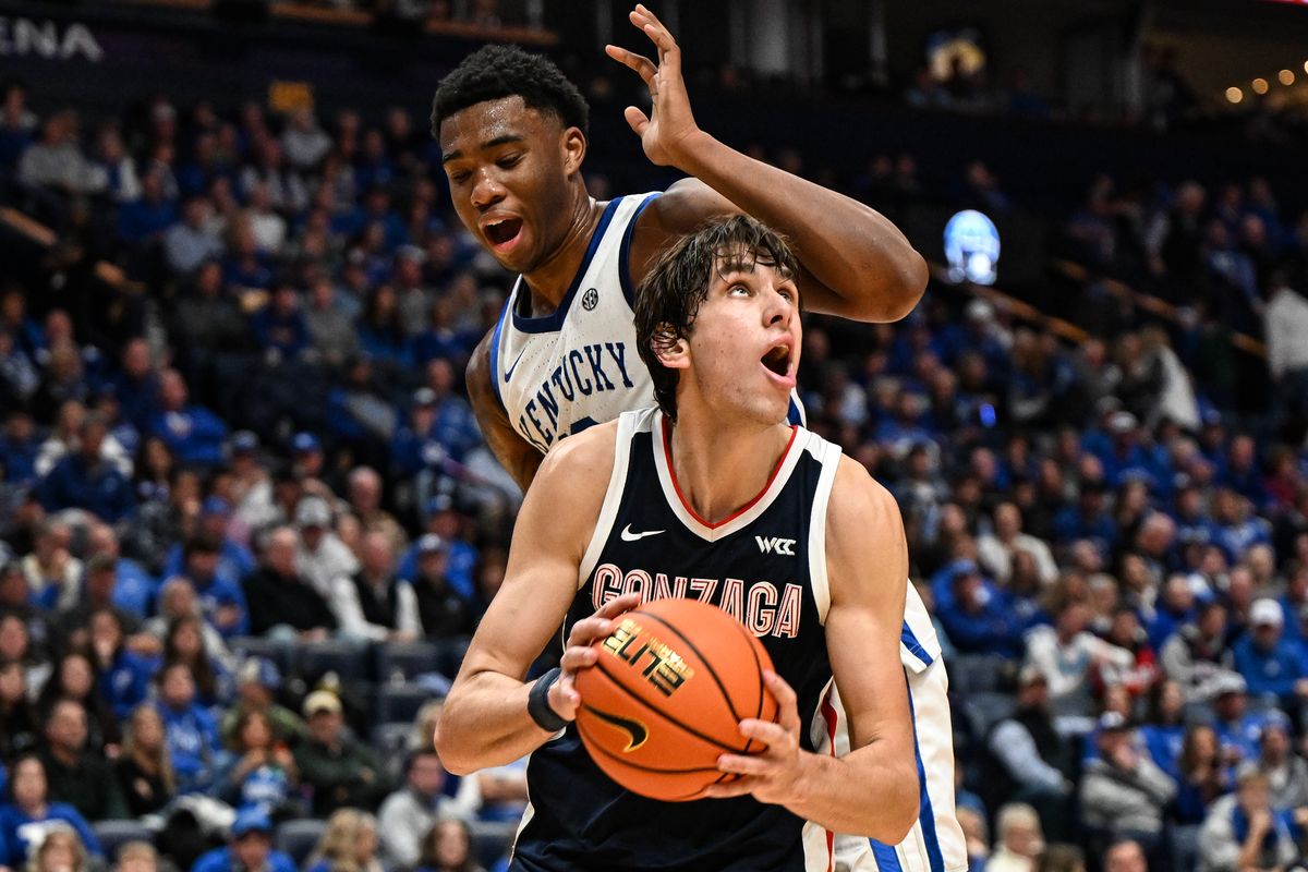 Gonzaga Bulldogs forward Braden Huff (34) rolls around Kentucky Wildcats forward Brandon Garrison (10) and scores during the second half of a college basketball game on Friday, Dec 5, 2025, at Bridgestone Area in Nashville, Tenn. Gonzaga won the game 94-59. (Tyler Tjomsland/The Spokesman-Review)