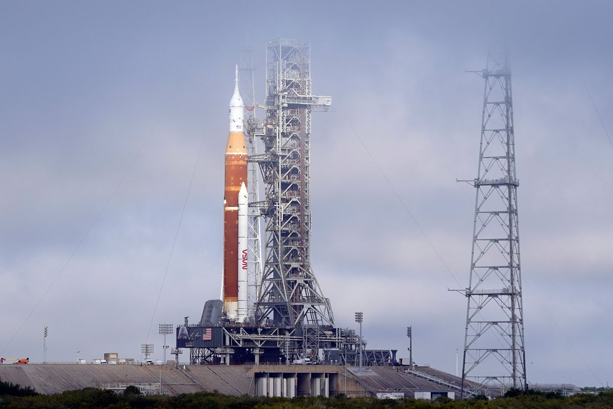 FILE -The NASA Artemis rocket with the Orion spacecraft aboard stands on pad 39B at the Kennedy Space Center in Cape Canaveral, Fla., March 18, 2022. After a series of equipment problems, NASA attempted an abbreviated fueling test of its mega moon rocket Thursday, April 14, 2022 at Florida