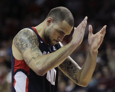 Gonzaga senior center Rob Sacre will be going to the NCAA tournament for the fourth time in his career with the Zags. (Associated Press)