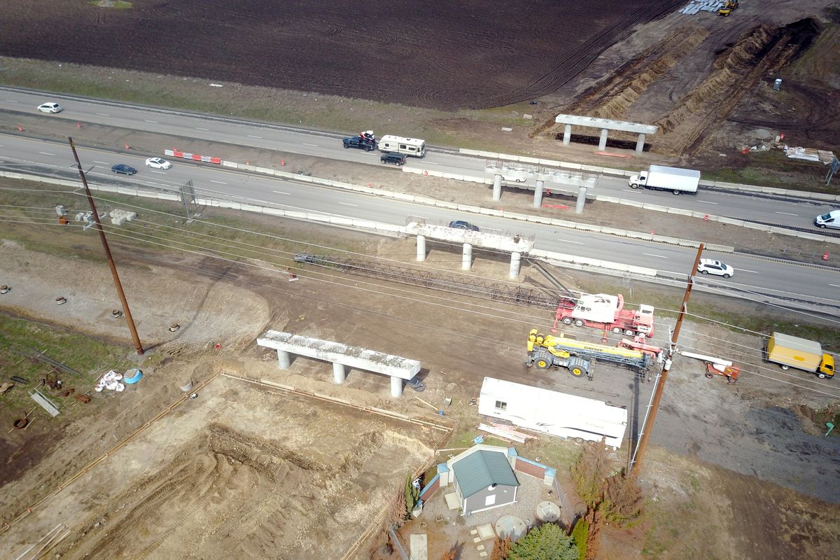 These are the supports for a new freeway overpass that will carry Kramer Parkway over I-90 in the area between the Barker Road and the Harvard Road exit, shown Friday, April 15, 2022.  (JESSE TINSLEY)
